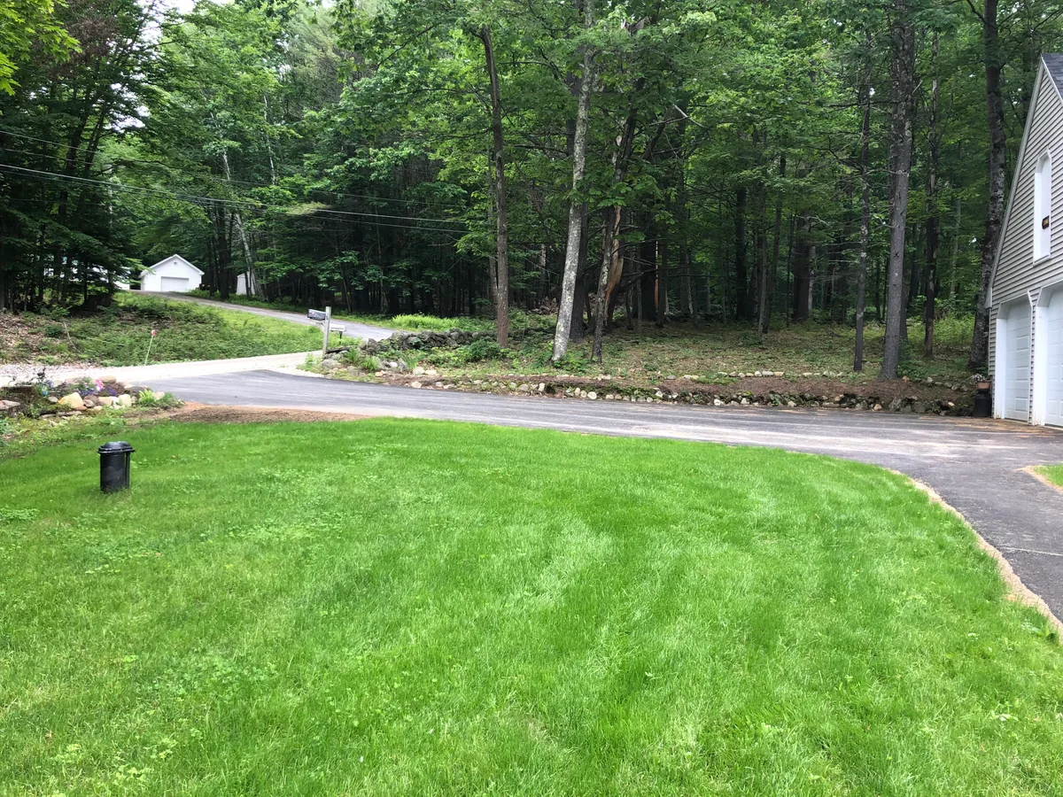 New Hampshire wooded property with organic lawn